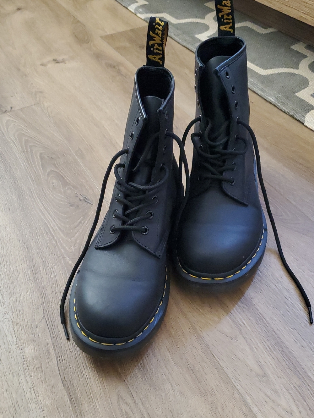 Dr. Martens Black Leather 6-Eye Lace-Up Boots with Yellow Stitching
